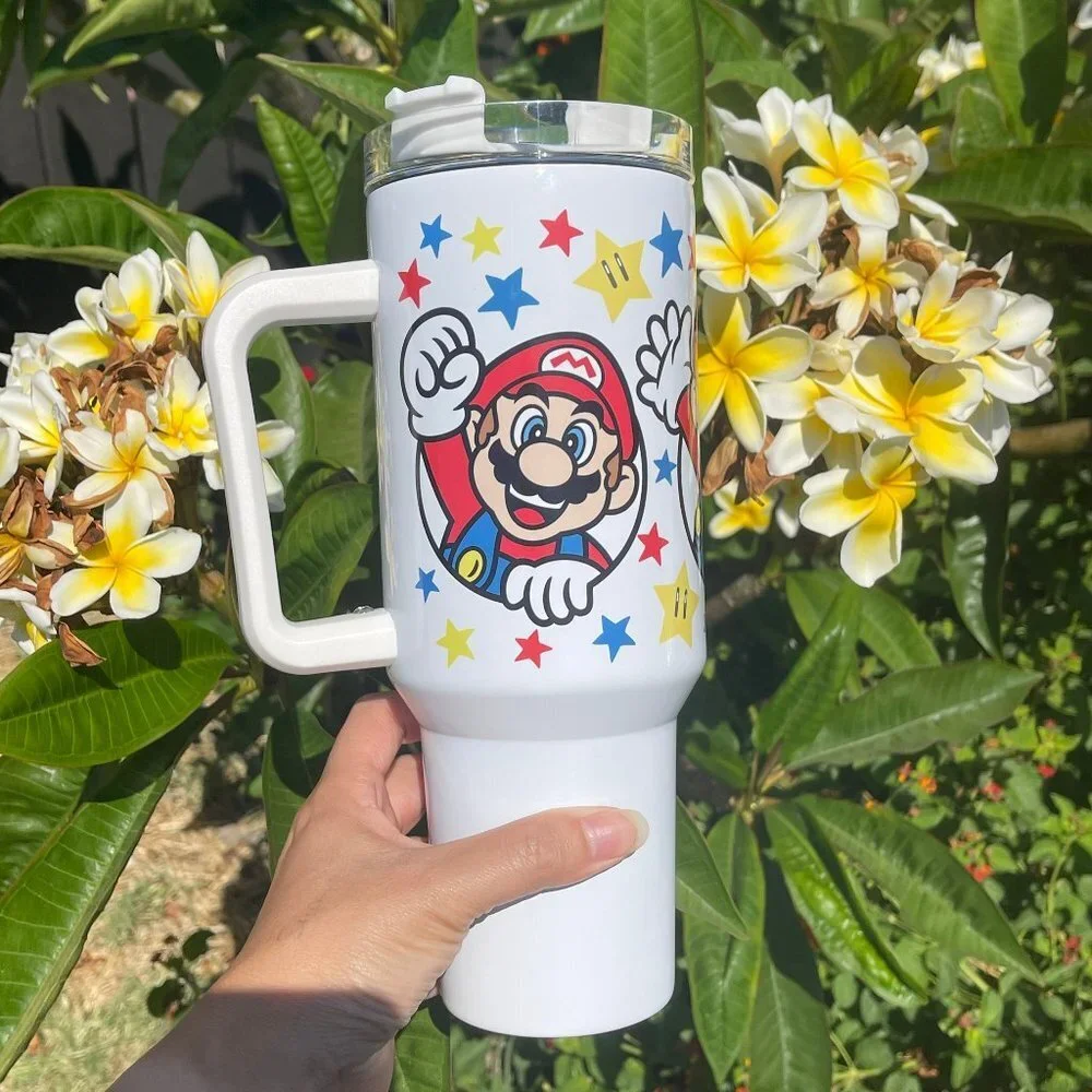 Nintendo Super Mario Bros Tumbler 40 oz umbler with hand carry handle. Brand New